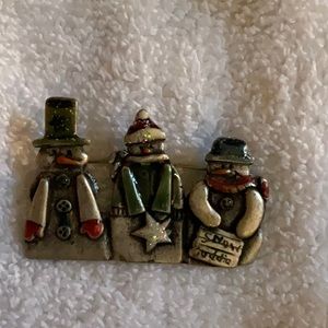 Metal snow people